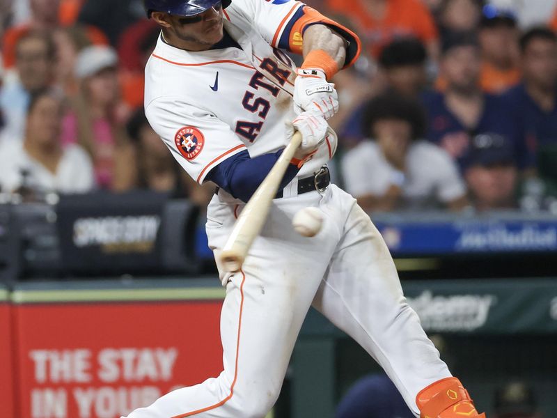 May 18, 2024; Houston, Texas, USA; Houston Astros shortstop Jeremy Pena (3) hits a stand up double against the Milwaukee Brewers in the sixth inning at Minute Maid Park. Mandatory Credit: Thomas Shea-USA TODAY Sports