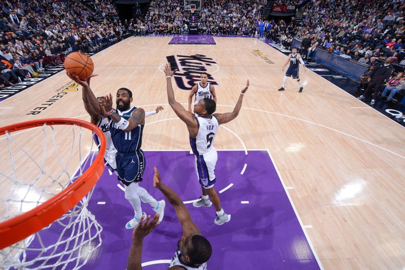 SACRAMENTO, CA - MARCH 29:  Kyrie Irving #11 of the Dallas Mavericks goes to the basket during the game on March 29, 2024 at Golden 1 Center in Sacramento, California. NOTE TO USER: User expressly acknowledges and agrees that, by downloading and or using this Photograph, user is consenting to the terms and conditions of the Getty Images License Agreement. Mandatory Copyright Notice: Copyright 2024 NBAE (Photo by Rocky Widner/NBAE via Getty Images)