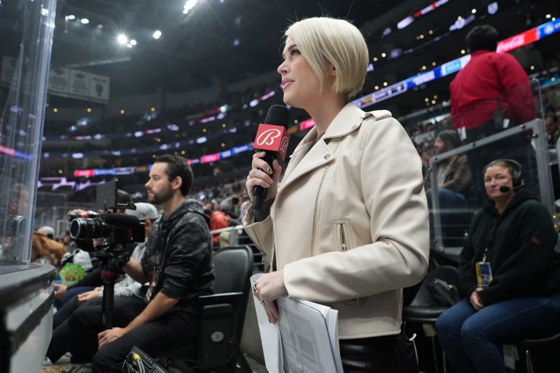 Dec 20, 2023; Los Angeles, California, USA; Bally Sports reporter Carrlyn Bathe during the game between the LA Kings and the Seattle Kraken at Crypto.com Arena. Mandatory Credit: Kirby Lee-USA TODAY Sports