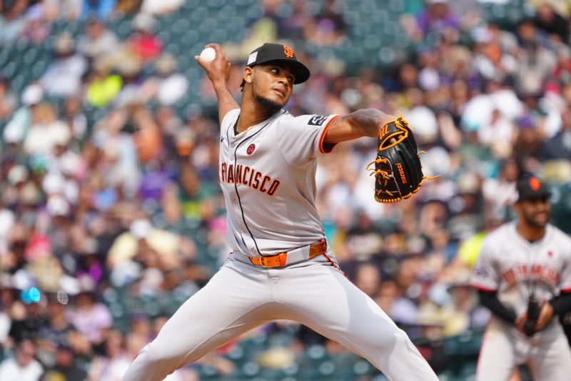 Jul 21, 2024; Denver, Colorado, USA; San Francisco Giants relief pitcher Camilo Doval (75) delivers a pitch in the ninth inning against the Colorado Rockies at Coors Field. Mandatory Credit: Ron Chenoy-USA TODAY Sports