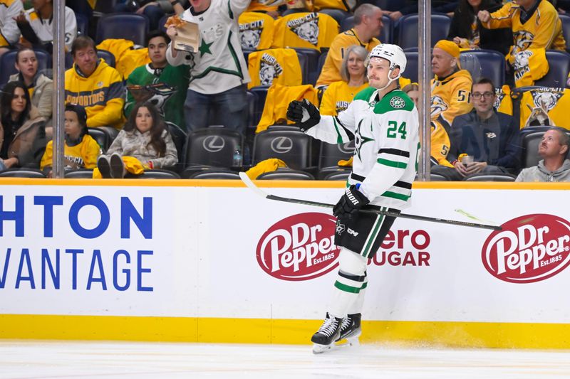 Oct 10, 2024; Nashville, Tennessee, USA; Dallas Stars center Roope Hintz (24) celebrates his goal against the Nashville Predators during the second period at Bridgestone Arena. Mandatory Credit: Steve Roberts-Imagn Images