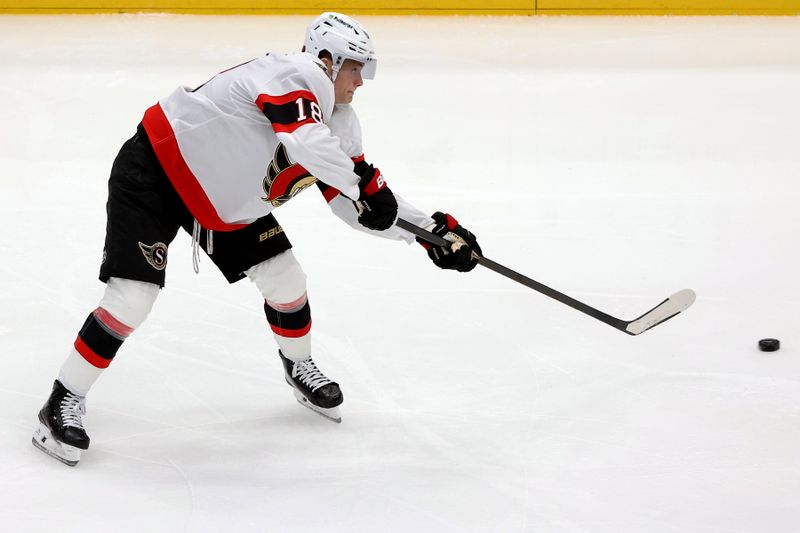 Mar 18, 2026; Washington, District of Columbia, USA; Ottawa Senators center Tim Stützle (18) takes a shot during the third period against the Washington Capitals at Capital One Arena. Mandatory Credit: Daniel Kucin Jr.-Imagn Images