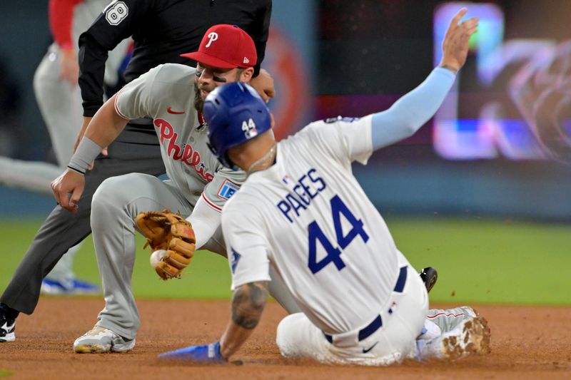 Sep 17, 2025; Los Angeles, California, USA;  Los Angeles Dodgers center fielder Andy Pages (44) beats the throw to Philadelphia Phillies left fielder Weston Wilson (37) for a stolen base in the fourth inning at Dodger Stadium. Mandatory Credit: Jayne Kamin-Oncea-Imagn Images