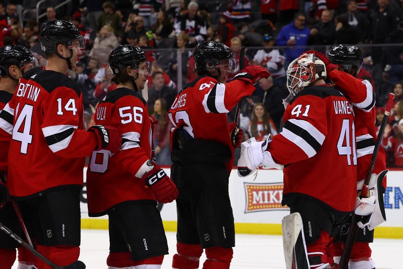 Feb 6, 2024; Newark, New Jersey, USA; The New Jersey Devils celebrate their win over the Colorado Avalanche at Prudential Center. Mandatory Credit: Ed Mulholland-USA TODAY Sports