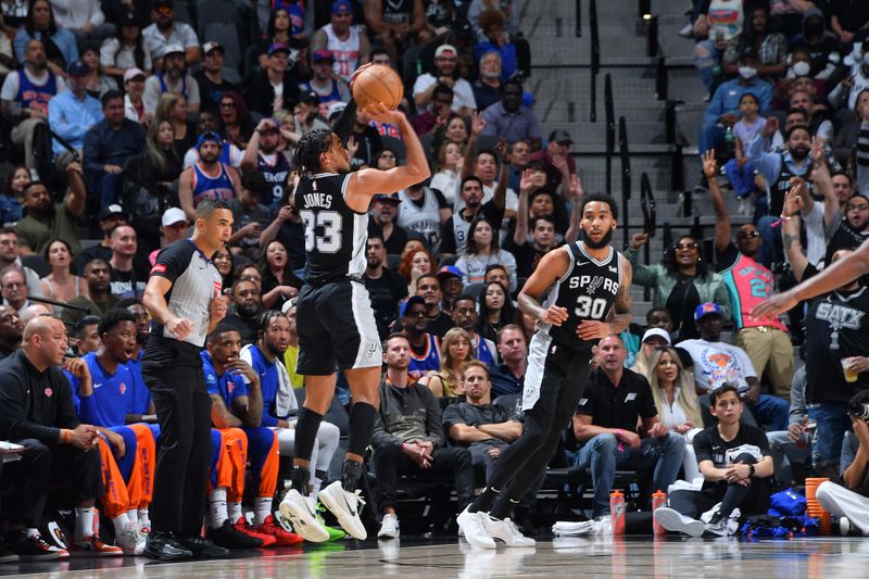 SAN ANTONIO, TX - MARCH 29: Tre Jones #33 of the San Antonio Spurs shoots the ball during the game against the New York Knicks on March 29, 2024 at the Frost Bank Center in San Antonio, Texas. NOTE TO USER: User expressly acknowledges and agrees that, by downloading and or using this photograph, user is consenting to the terms and conditions of the Getty Images License Agreement. Mandatory Copyright Notice: Copyright 2024 NBAE (Photos by Michael Gonzales/NBAE via Getty Images)