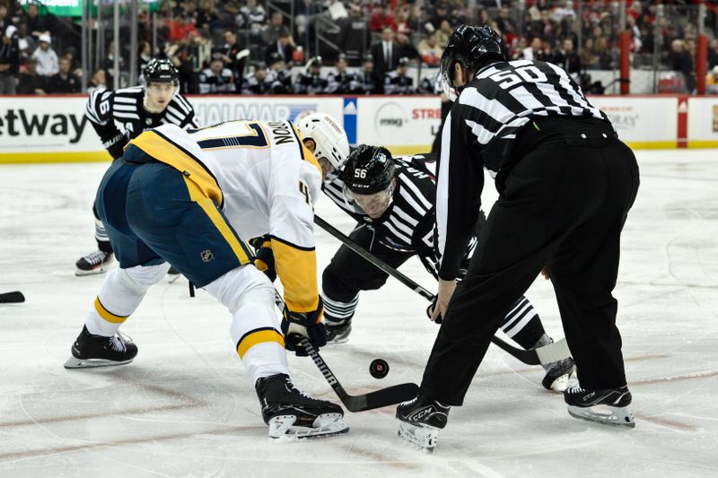 Apr 7, 2024; Newark, New Jersey, USA; Nashville Predators right wing Michael McCarron (47) faces off against New Jersey Devils left wing Erik Haula (56) during the second period at Prudential Center. Mandatory Credit: John Jones-USA TODAY Sports