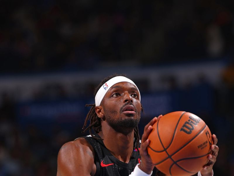 OKLAHOMA CITY, OK - NOVEMBER 20: Jerami Grant #9 of the Portland Trail Blazers shoots a free throw during the game against the Oklahoma City Thunder on November 20, 2024 at Paycom Center in Oklahoma City, Oklahoma. NOTE TO USER: User expressly acknowledges and agrees that, by downloading and or using this photograph, User is consenting to the terms and conditions of the Getty Images License Agreement. Mandatory Copyright Notice: Copyright 2024 NBAE (Photo by Zach Beeker/NBAE via Getty Images)