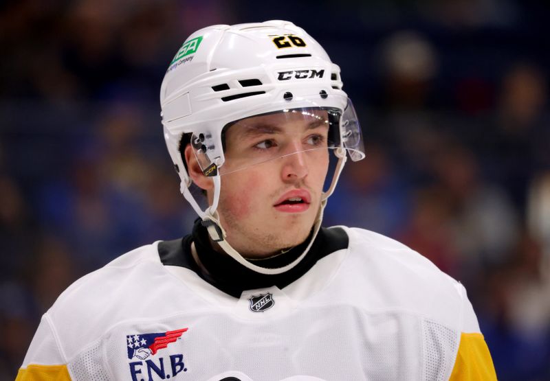 Sep 21, 2024; Buffalo, New York, USA;  Pittsburgh Penguins center Tristan Broz (26) during a stoppage in play against the Buffalo Sabres during the second period at KeyBank Center. Mandatory Credit: Timothy T. Ludwig-Imagn Images