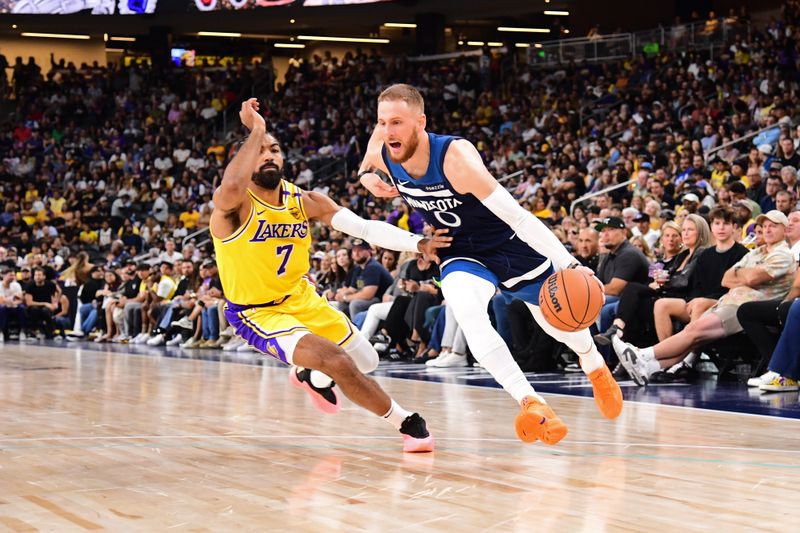 PALM SPRINGS, CA - OCTOBER 4: Donte DiVincenzo #0 of the Minnesota Timberwolves drives to the basket during the game against the Los Angeles Lakers during an NBA preseason game on October 4, 2024 at Acrisure Arena in Palm Springs, California. NOTE TO USER: User expressly acknowledges and agrees that, by downloading and/or using this Photograph, user is consenting to the terms and conditions of the Getty Images License Agreement. Mandatory Copyright Notice: Copyright 2024 NBAE (Photo by Adam Pantozzi/NBAE via Getty Images)