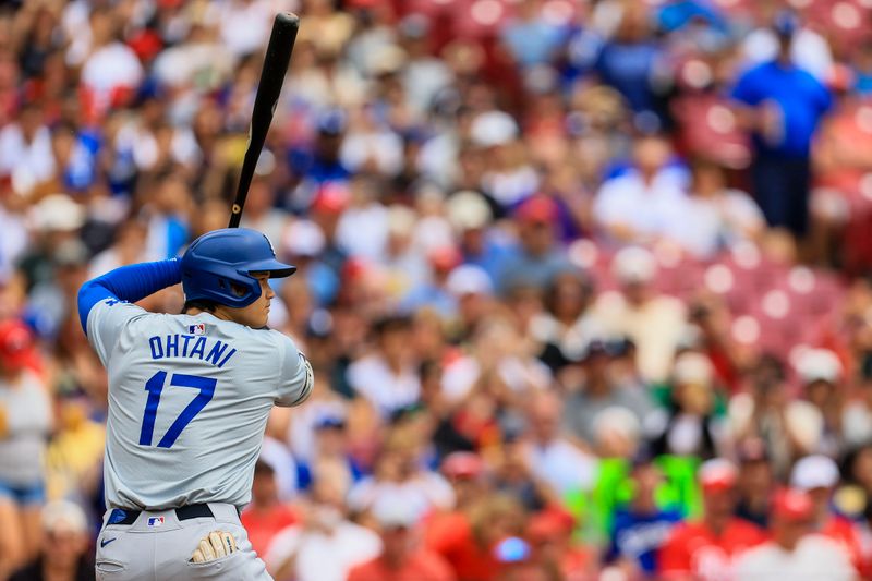 May 26, 2024; Cincinnati, Ohio, USA; Los Angeles Dodgers designated hitter Shohei Ohtani (17) bats in the first inning against the Cincinnati Reds at Great American Ball Park. Mandatory Credit: Katie Stratman-USA TODAY Sports