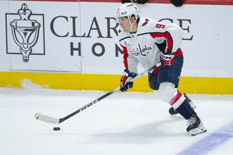 Jan 1, 2026; Ottawa, Ontario, CAN; Washington Capitals right wing Ryan Leonard (9) skates with the puck in the third period against the Ottawa Senators at the Canadian Tire Centre. Mandatory Credit: Marc DesRosiers-IMAGN Images