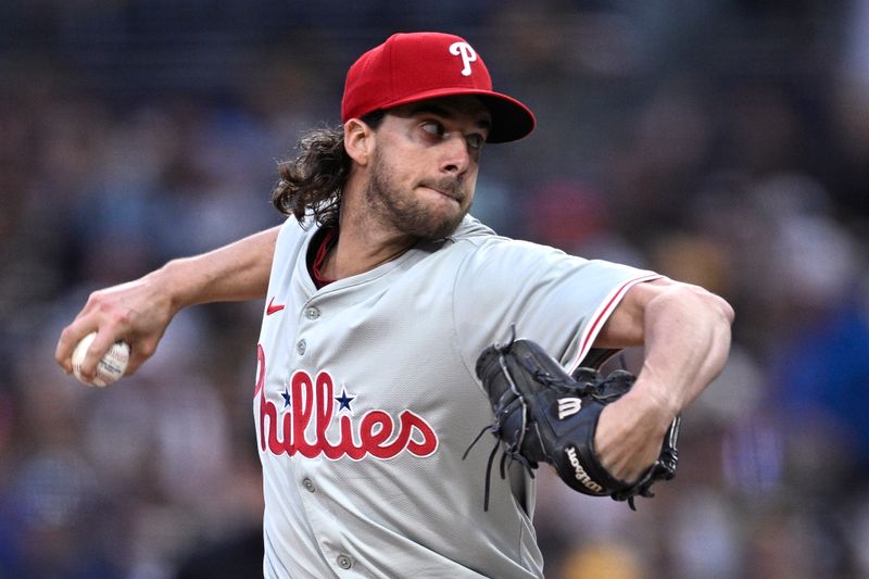 Apr 26, 2024; San Diego, California, USA; Philadelphia Phillies starting pitcher Aaron Nola (27) throws a pitch against the San Diego Padres during the first inning at Petco Park. Mandatory Credit: Orlando Ramirez-USA TODAY Sports