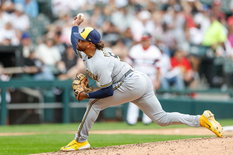 Aug 13, 2023; Chicago, Illinois, USA; Milwaukee Brewers starting pitcher Freddy Peralta (51) delivers a pitch against the Chicago White Sox during the fifth inning at Guaranteed Rate Field. Mandatory Credit: Kamil Krzaczynski-USA TODAY Sports