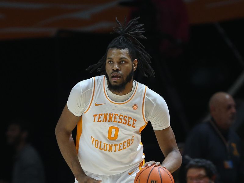 Dec 5, 2023; Knoxville, Tennessee, USA; Tennessee Volunteers forward Jonas Aidoo (0) dribbles against the George Mason Patriots during the first half at Thompson-Boling Arena at Food City Center. Mandatory Credit: Randy Sartin-USA TODAY Sports