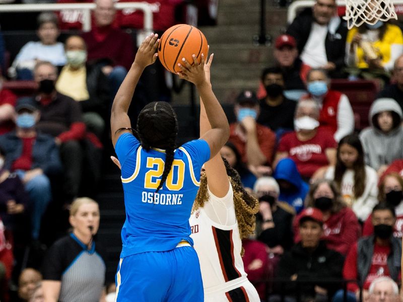 Feb 20, 2023; Stanford, California, USA;  UCLA Bruins guard Charisma Osborne (20) shoots against the Stanford Cardinal during the first half at Maples Pavilion. Mandatory Credit: John Hefti-USA TODAY Sports