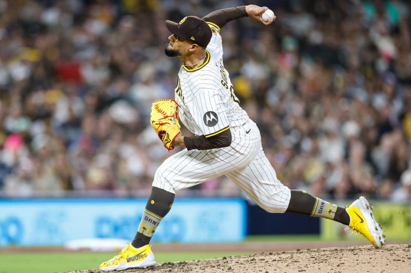 Apr 12, 2025; San Diego, California, USA; San Diego Padres relief pitcher Robert Suarez (75) throws a pitch during the ninth inning against the Colorado Rockies at Petco Park. Mandatory Credit: David Frerker-Imagn Images