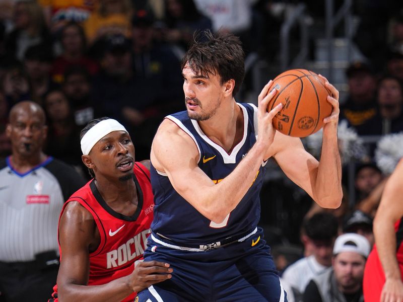 DENVER, CO - JANUARY 15: Dario Saric #9 of the Denver Nuggets handles the ball during the game against the Houston Rockets on January 15, 2025 at Ball Arena in Denver, Colorado. NOTE TO USER: User expressly acknowledges and agrees that, by downloading and/or using this Photograph, user is consenting to the terms and conditions of the Getty Images License Agreement. Mandatory Copyright Notice: Copyright 2025 NBAE (Photo by Bart Young/NBAE via Getty Images)