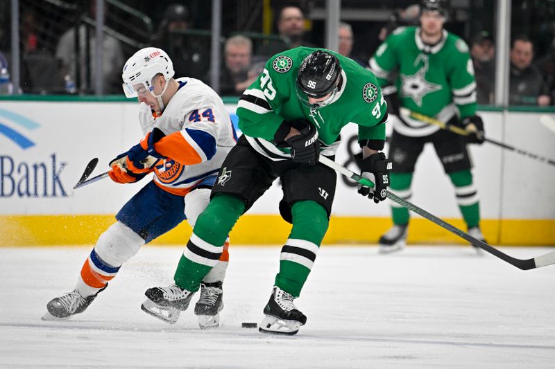 Feb 26, 2024; Dallas, Texas, USA; New York Islanders center Jean-Gabriel Pageau (44) and Dallas Stars center Matt Duchene (95) battle for control of the puck during the third period at the American Airlines Center. Mandatory Credit: Jerome Miron-USA TODAY Sports