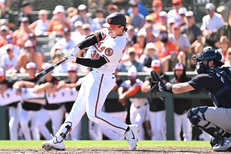 Feb 20, 2026; Sarasota, Florida, USA;  Baltimore Orioles designated hitter Adley Rutschman (35) hits a single in the second inning of the game against the New York Yankees during spring training at Ed Smith Stadium. Mandatory Credit: Jonathan Dyer-Imagn Images