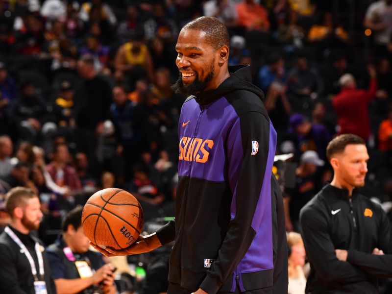 PHOENIX, AZ - NOVEMBER 26: Kevin Durant #35 of the Phoenix Suns smiles before the game against the Los Angeles Lakers during the Emirates NBA Cup game on November 26, 2024 at Footprint Center in Phoenix, Arizona. NOTE TO USER: User expressly acknowledges and agrees that, by downloading and or using this photograph, user is consenting to the terms and conditions of the Getty Images License Agreement. Mandatory Copyright Notice: Copyright 2024 NBAE (Photo by Barry Gossage/NBAE via Getty Images)