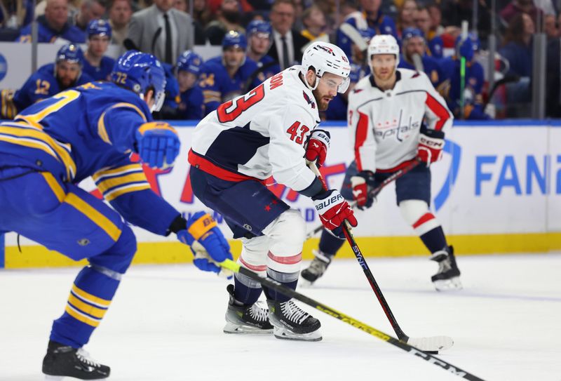 Apr 11, 2024; Buffalo, New York, USA;  Washington Capitals right wing Tom Wilson (43) skates with the puck during the first period against the Buffalo Sabres at KeyBank Center. Mandatory Credit: Timothy T. Ludwig-USA TODAY Sports