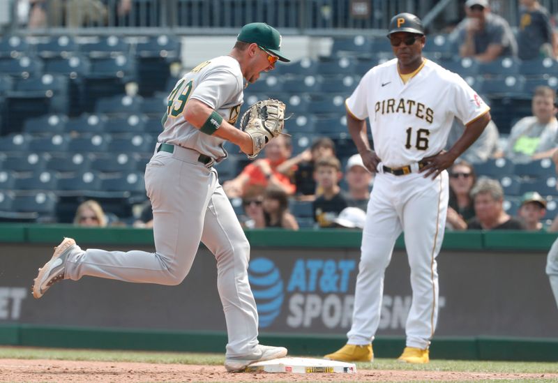 Jun 7, 2023; Pittsburgh, Pennsylvania, USA;  Oakland Athletics first baseman Ryan Noda (49) reacts as he steps on first base to record the final out against the Pittsburgh Pirates during the ninth inning at PNC Park. Oakland won 9-5. Mandatory Credit: Charles LeClaire-USA TODAY Sports