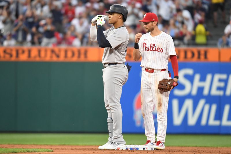 Jul 29, 2024; Philadelphia, Pennsylvania, USA; New York Yankees outfielder Juan Soto (22) celebrates his two RBI double against the Philadelphia Phillies during the fifth inning at Citizens Bank Park. Mandatory Credit: Eric Hartline-USA TODAY Sports
