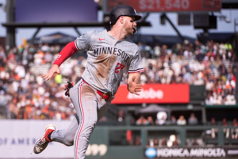 Jul 13, 2024; San Francisco, California, USA; Minnesota Twins catcher Ryan Jeffers (27) rounds third base on his way to score during the fourth inning against the San Francisco Giants at Oracle Park. Mandatory Credit: Ed Szczepanski-USA TODAY Sports