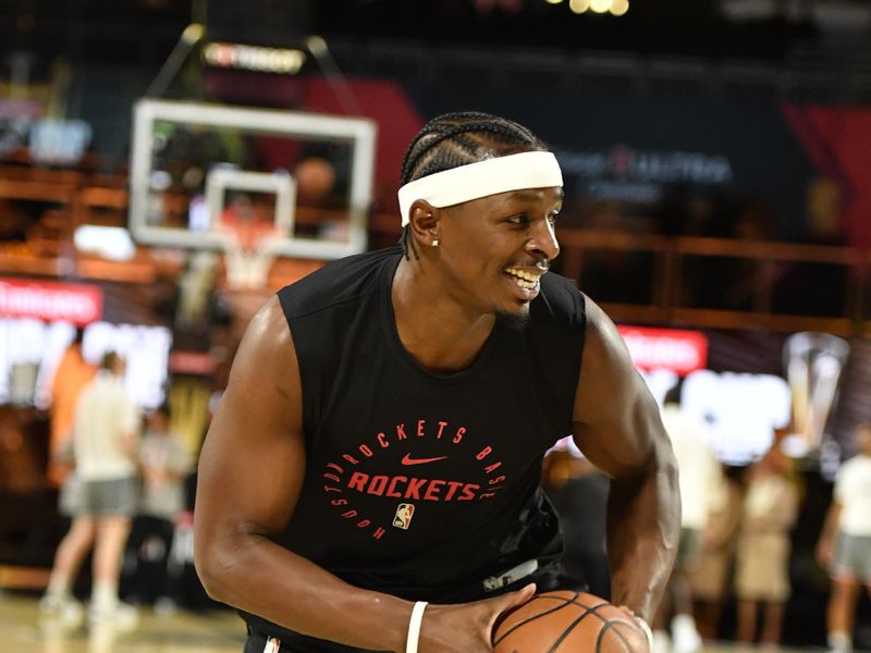 LAS VEGAS, NV - DECEMBER 14: Jae'Sean Tate #8 of the Houston Rockets warms up before the game against the Oklahoma City Thunder during the Emirates NBA Cup Semifinal game on December 14, 2024 at T-Mobile Arena in Las Vegas, Nevada. NOTE TO USER: User expressly acknowledges and agrees that, by downloading and/or using this Photograph, user is consenting to the terms and conditions of the Getty Images License Agreement. Mandatory Copyright Notice: Copyright 2024 NBAE (Photo by Logan Riely/NBAE via Getty Images)