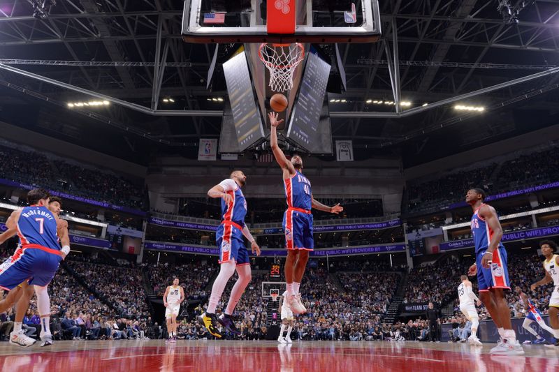 SACRAMENTO, CA - NOVEMBER 16: Trey Lyles #41 of the Sacramento Kings goes up for the rebound during the game against the Utah Jazz on November 16, 2024 at Golden 1 Center in Sacramento, California. NOTE TO USER: User expressly acknowledges and agrees that, by downloading and or using this Photograph, user is consenting to the terms and conditions of the Getty Images License Agreement. Mandatory Copyright Notice: Copyright 2024 NBAE (Photo by Rocky Widner/NBAE via Getty Images)