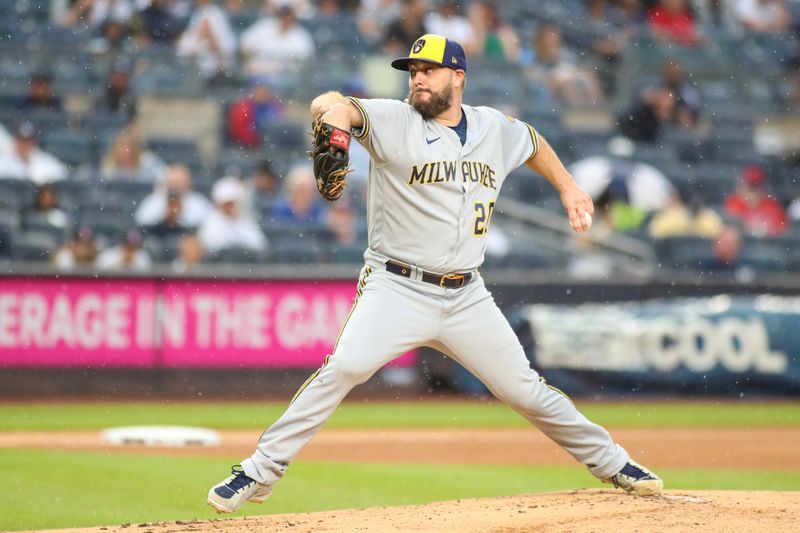 Sep 9, 2023; Bronx, New York, USA;  Milwaukee Brewers starting pitcher Wade Miley (20) pitches in the first inning against the New York Yankees at Yankee Stadium. Mandatory Credit: Wendell Cruz-USA TODAY Sports