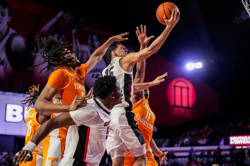 Jan 13, 2024; Athens, Georgia, USA; Georgia Bulldogs guard RJ Melendez (15) takes the ball to the basket against the Tennessee Volunteers during the second half at Stegeman Coliseum. Mandatory Credit: Dale Zanine-USA TODAY Sports