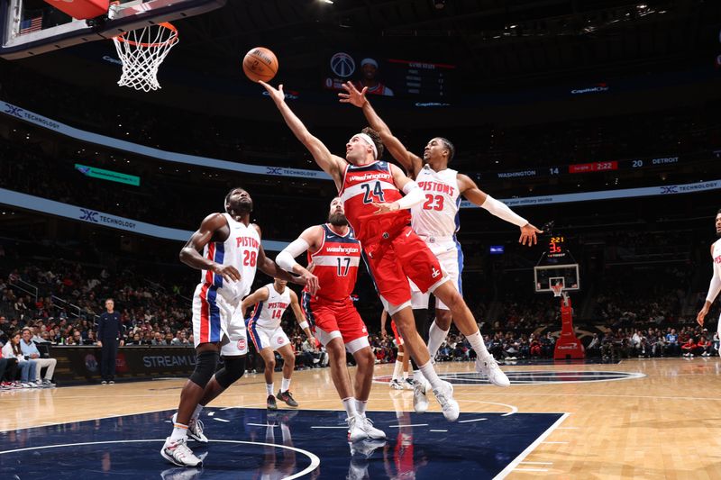 WASHINGTON, DC -? NOVEMBER 17: Corey Kispert #24 of the Washington Wizards drives to the basket during the game against the Detroit Pistons on November 17, 2024 at Capital One Arena in Washington, DC. NOTE TO USER: User expressly acknowledges and agrees that, by downloading and or using this Photograph, user is consenting to the terms and conditions of the Getty Images License Agreement. Mandatory Copyright Notice: Copyright 2024 NBAE (Photo by Stephen Gosling/NBAE via Getty Images)