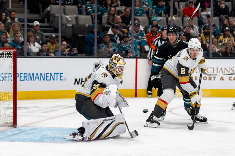 Feb 19, 2024; San Jose, California, USA; Vegas Golden Knights goaltender Logan Thompson (36) makes a save against the San Jose Sharks during the second period at SAP Center at San Jose. Mandatory Credit: Neville E. Guard-USA TODAY Sports