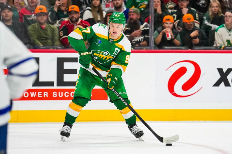 Nov 3, 2024; Saint Paul, Minnesota, USA; Minnesota Wild left wing Kirill Kaprizov (97) looks to pass during the second period against the Toronto Maple Leafs at Xcel Energy Center. Mandatory Credit: Brace Hemmelgarn-Imagn Images