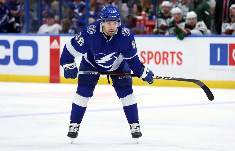 Jan 18, 2024; Tampa, Florida, USA; Tampa Bay Lightning left wing Brandon Hagel (38) against the Minnesota Wild during the third period at Amalie Arena. Mandatory Credit: Kim Klement Neitzel-USA TODAY Sports