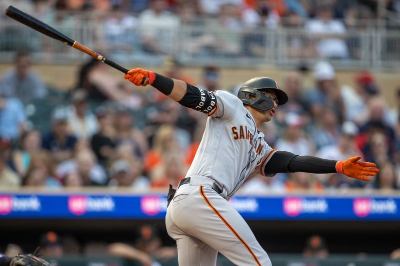 May 23, 2023; Minneapolis, Minnesota, USA; San Francisco Giants designated hitter Blake Sabol (2) hits a double in the fourth inning against the Minnesota Twins at Target Field. Mandatory Credit: Jesse Johnson-USA TODAY Sports