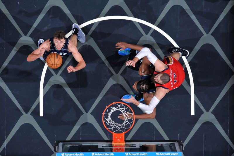 ORLANDO, FL - MARCH 21: Franz Wagner #22 of the Orlando Magic rebounds the ball during the game against the New Orleans Pelicans on March 21, 2024 at Amway Center in Orlando, Florida. NOTE TO USER: User expressly acknowledges and agrees that, by downloading and or using this photograph, User is consenting to the terms and conditions of the Getty Images License Agreement. Mandatory Copyright Notice: Copyright 2024 NBAE (Photo by Fernando Medina/NBAE via Getty Images)