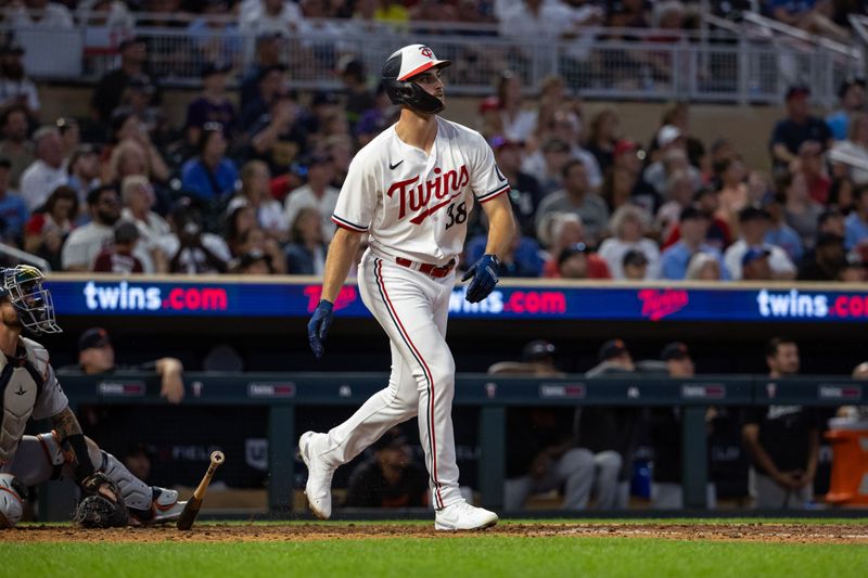 Aug 15, 2023; Minneapolis, Minnesota, USA; Minnesota Twins left fielder Matt Wallner (38) hits a grand slam during the sixth inning against the Detroit Tigers at Target Field. Mandatory Credit: Jordan Johnson-USA TODAY Sports