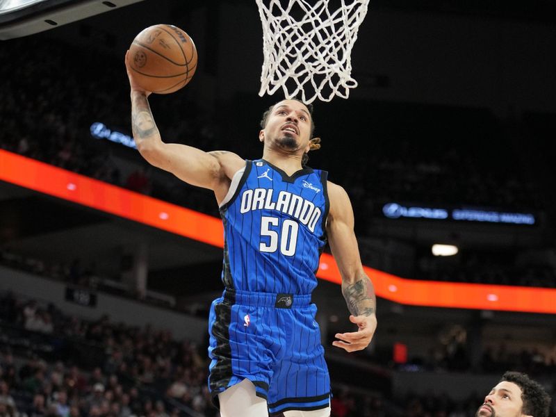 MINNEAPOLIS, MN -  FEBRUARY 3: Cole Anthony #50 of the Orlando Magic drives to the basket during the game against the Minnesota Timberwolves on February 3, 2023 at Target Center in Minneapolis, Minnesota. NOTE TO USER: User expressly acknowledges and agrees that, by downloading and or using this Photograph, user is consenting to the terms and conditions of the Getty Images License Agreement. Mandatory Copyright Notice: Copyright 2022 NBAE (Photo by Jordan Johnson/NBAE via Getty Images)