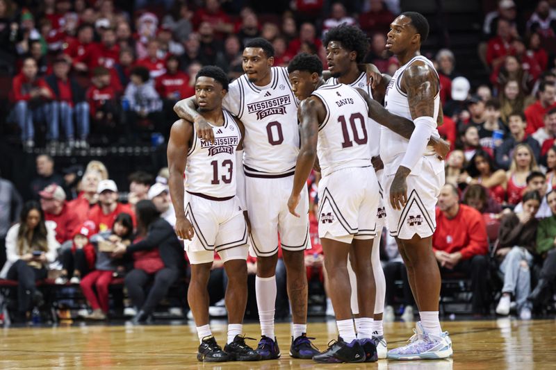 Dec 23, 2023; Newark, NY, USA; Mississippi State Bulldogs guard Josh Hubbard (13) and forward D.J. Jeffries (0) and  Bulldogs guard Dashawn Davis (10) huddle with teammates during the first half against the Rutgers Scarlet Knights at Prudential Center. Mandatory Credit: Vincent Carchietta-USA TODAY Sports