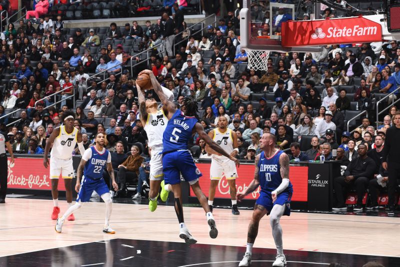 LOS ANGELES, CA - APRIL 12: Bones Hyland #5 of the LA Clippers blocks the shot during the game against the Utah Jazz on April 12, 2024 at Crypto.Com Arena in Los Angeles, California. NOTE TO USER: User expressly acknowledges and agrees that, by downloading and/or using this Photograph, user is consenting to the terms and conditions of the Getty Images License Agreement. Mandatory Copyright Notice: Copyright 2024 NBAE (Photo by Adam Pantozzi/NBAE via Getty Images)