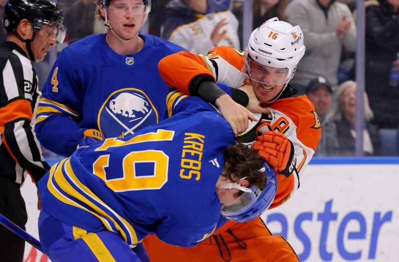 Feb 25, 2025; Buffalo, New York, USA;  Buffalo Sabres center Peyton Krebs (19) and Anaheim Ducks center Ryan Strome (16) fight during the first period at KeyBank Center. Mandatory Credit: Timothy T. Ludwig-Imagn Images