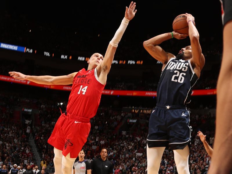 MIAMI, FL - NOVEMBER 24: Spencer Dinwiddie #26 of the Dallas Mavericks shoots the ball during the game against the Miami Heat on November 24, 2024 at Kaseya Center in Miami, Florida. NOTE TO USER: User expressly acknowledges and agrees that, by downloading and or using this Photograph, user is consenting to the terms and conditions of the Getty Images License Agreement. Mandatory Copyright Notice: Copyright 2024 NBAE (Photo by Issac Baldizon/NBAE via Getty Images)