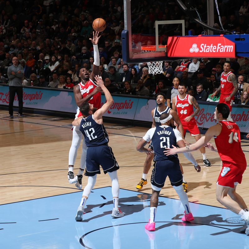 MEMPHIS, TN - JANUARY 6:  Jaren Jackson Jr. #13 of the Memphis Grizzlies shoots the ball during the game against the Dallas Mavericks  on January  6, 2024 at FedExForum in Memphis, Tennessee. NOTE TO USER: User expressly acknowledges and agrees that, by downloading and or using this photograph, User is consenting to the terms and conditions of the Getty Images License Agreement. Mandatory Copyright Notice: Copyright 2024 NBAE (Photo by Joe Murphy/NBAE via Getty Images)