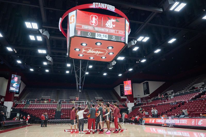 Jan 18, 2024; Stanford, California, USA; Washington State Cougars players huddle at center court before the game between the Stanford Cardinal and the Washington State Cougars at Maples Pavilion. Mandatory Credit: Robert Edwards-USA TODAY Sports