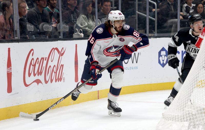 Nov 9, 2024; Los Angeles, California, USA; Columbus Blue Jackets right wing Kirill Marchenko (86) looks to pass during the first period against the Los Angeles Kings at Crypto.com Arena. Mandatory Credit: Jason Parkhurst-Imagn Images