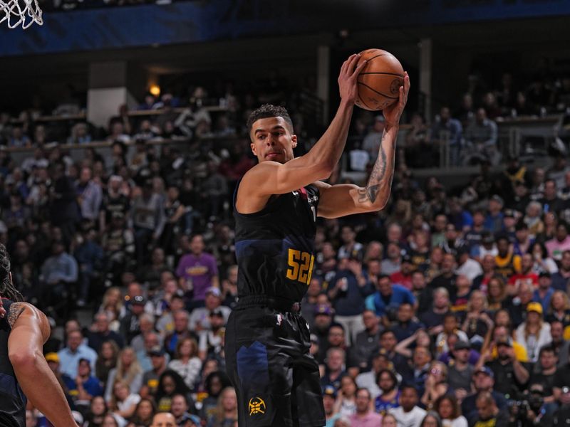 DENVER, CO - APRIL 22: Michael Porter Jr. #1 of the Denver Nuggets rebounds the ball during the game against the Los Angeles Lakers on April 22, 2024 at the Ball Arena in Denver, Colorado. NOTE TO USER: User expressly acknowledges and agrees that, by downloading and/or using this Photograph, user is consenting to the terms and conditions of the Getty Images License Agreement. Mandatory Copyright Notice: Copyright 2024 NBAE (Photo by Bart Young/NBAE via Getty Images)