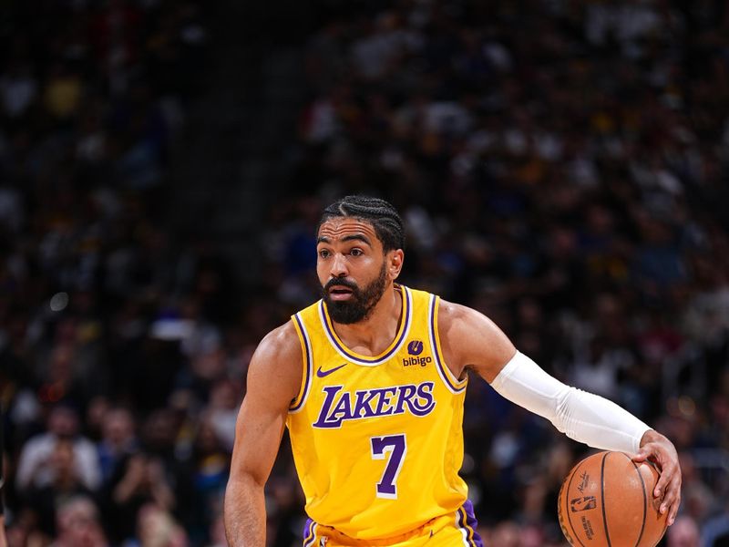 DENVER, CO - APRRIL 22: Gabe Vincent #7 of the Los Angeles Lakers dribbles the ball during the game against the Denver Nuggets during Round 1 Game 2 of the 2024 NBA Playoffs on April 22, 2024 at the Ball Arena in Denver, Colorado. NOTE TO USER: User expressly acknowledges and agrees that, by downloading and/or using this Photograph, user is consenting to the terms and conditions of the Getty Images License Agreement. Mandatory Copyright Notice: Copyright 2024 NBAE (Photo by Garrett Ellwood/NBAE via Getty Images)