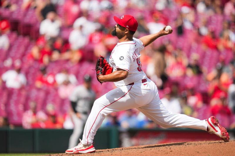 Jun 8, 2025; Cincinnati, Ohio, USA; Cincinnati Reds pitcher Tony Santillan (64) throws against the Arizona Diamondbacks in the ninth inning at Great American Ball Park. Mandatory Credit: Aaron Doster-Imagn Images